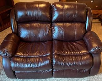 Ashley Furniture Brown Leather Reclining Love Seat