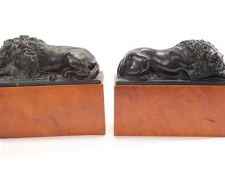 Bronze Lions on Burled Wood