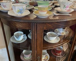 Rounded Glass Front Display Case with Mirror, Assortment of Fine China