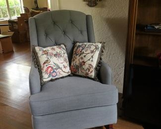 Rocking chair in soft blue-gray fabric