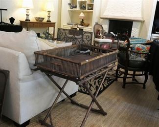 One of a pair of rattan table/servers.