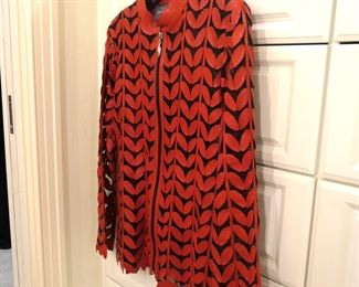 Suede leaves create an eye-catching jacket. Size Med.