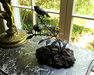 Charming bronze sculpture of song birds.