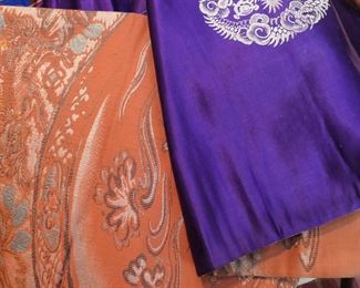 Obi - reversible. One side is orange design and the reverse is purple silk.