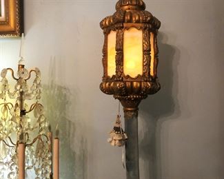 Detail of parlor lamp when lit. Details of girandoles at left.