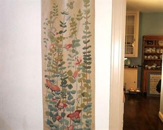 Vertical needlepoint wall hanging featuring butterflies.