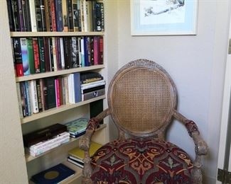 One of a pair of large scale fauteuils  with cane backs.