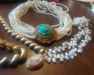 Pearl and 14k necklaces. Multi strand necklace is choker length.