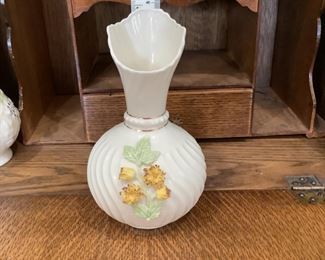7th mark. Vase with applied yellow flowers $30