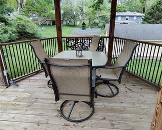 PATIO SET - TABLE W/4 SWIVEL ROCKING CHAIRS - $150