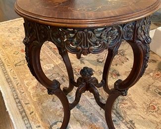 Pair of inlaid and carved side tables