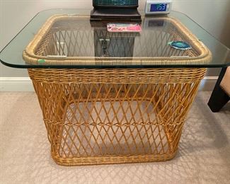 Pair of wicker and glass end tables 