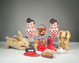 (12PC) VINTAGE TOYS | Including Two Big Boy Banks, Big Little Book "The Lost Patrol", Alilo England Tin Nursery Rhymes Pail; Plastic Cowboy Boot Bank, Gun Rubber Co. Truck, Child's Sugar Bowl, Wolverine Toy Iron, Plastic Piggy Bank, Pottery Sheep, Two Stuffed Bunnies - h. 8 in (Big boy largest)
