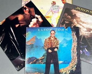 (4PC) ELTON JOHN & OTHER | Vinyl record albums, including:
Elton John's "Goodbye Yellow Brick Road"
Elton John "Caribou"
Jackson Browne "Running on Empty"
George Michael "Faith"