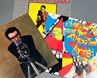 (3PC) ELVIS COSTELLO ALBUMS | Vinyl record albums by Elvis Costello, including: "This Years Model", "My Aim is True", and Elvis Costello and the Attractions "Armed Forces".