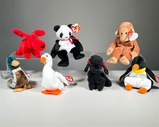 (7PC) 90S TY BEANIE BABIES | 1995-1998 TY Beanie Babies, including:
1995 "Waddle" penguin style 4075 (with PVC pellets)
1995 "Bongo" monkey style 4067
1996 "Rover" red dog style 4101
1996 "Gracie" goose style 4126
1998 "Fortune" panda (with December 6, 1997 date of birth)
1998 "Jake" duck (with April 16, 1997 date of birth)
1998 "Gigi" black poodle (with April 7, 1997 date of birth; stamped tush tag)