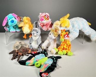 (9PC) 2000S BEANIE BABIES | TY Beanie Babies from the 2000s, including:
14-inch 2001 "Cutsie Moose" moose with rattle (no swing tag)
2000 "Float" butterfly
2000 "Hopper" rabbit
2000 "Hairy" spider
2001 "Chickie" baby chick
2001 "Carrots" spotted bunny rabbit
2003 "Kookie" blue and magenta dog
2003 "Giraffiti" giraffe
2004 "Mystique" pink tiger with 2003 tush tag