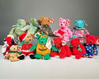 (12PC) TY BEANIE BABY BEARS | 2000s TY Beanie Babies for the holidays, including:
2003 "Tricky" pumpkin bear with 2003 tush tag and "10 yrs.." swing tag with "DATE OF BIRTH: November 15, 2002"
2001 "December" birthday bear with "December" "HAPPY BIRTHDAY !" swing tag
2003 "Hero" camo bear with "10 yrs" swing tag
Two "Mistletoe" bears with 2001 tush tags and "DATE OF BIRTH: December 18, 2000" swing tags
2004 "Kringle" Santa bear with 2003 swing tag
2002 "Liberty" bear with 2001 swing tag
2001 "Patriot" bear with 2000 swing tag
2003 "Holiday Teddy" teenie babie from The Jingle Beanies Collection with "2003 Holiday Teddy" tush tag and "Happy Holidays !" / "2003 Holiday Teddy" swing tag, with rattle inside
2005 "Hug-hug" Valentine's bear
Two 2004 "McWooly" green knit bears