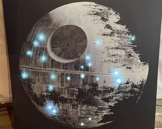 Pottery Barn Star Wars™ Death Star™ LED Stretched Canvas Art, LED lights twinkle from a random of spots on the Death Star, 36" x 36",  $185
