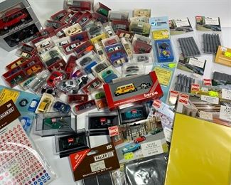 Huge Collection of Miniature Scale Model Porsche, Audi, Volkswagen, Police Cars and More - Brand Include Herpa, Siku, Busch, Wiking, and More - Easily Over 70 Model Cars in Original Packaging - Also Includes Unopened Model Scenery And Road Signs
