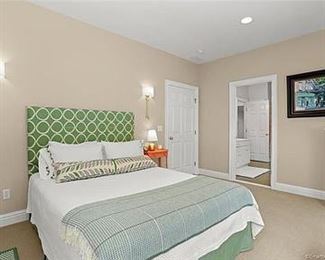 Custom bed, custom pillows, artwork, luxury linens