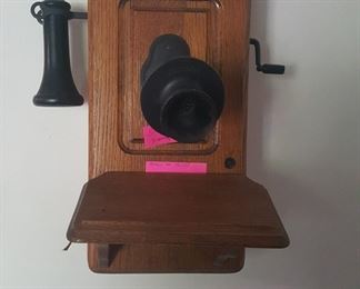 ANTIQUE TELEPHONE. IT IS REAL HAS ORIGINAL PHONE NUMBER ON PINK PAPER ON PHONE