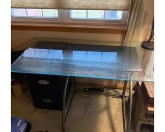 Glass desk with black stand