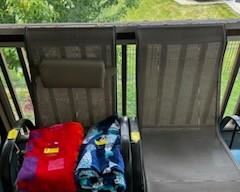 Patio chairs and beach towels (sold separately)