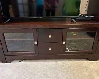 3 pc entertainment unit separates into 3 pieces -
*CENTER Console 54w x 20.5d x 24”h $65
*2 Sides $75 ea -32”w x 20.5d x 63.5h with: 
2 lower drawers 
Glass display area 
Pullout shelves