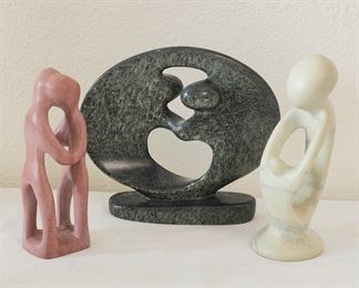 Stone couple figurines