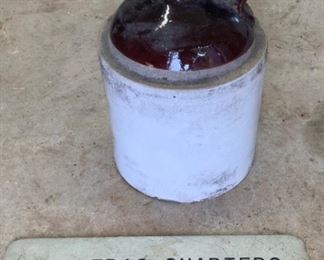 Ship placard and stoneware jug