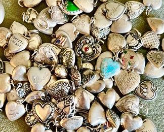 Large lot of Victorian and early 1900s sterling puffy hearts. Valuables removed daily!