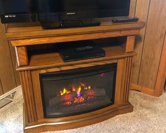Magnavox flat screen TV , TV stand with remote control fireplace