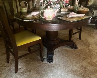 LARGE ROUND MAHOGANY DINING TABLE w/THICK CENTER POST AND CLAW FEET