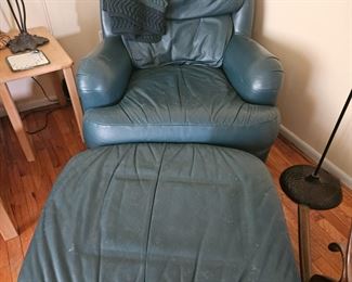 Green leather chair and ottoman