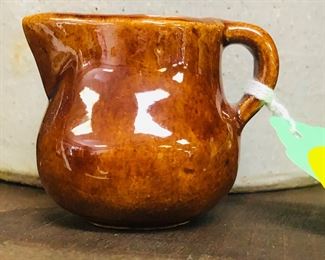 mini brown pitcher
