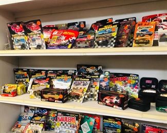 loads of die cast cars  mainly racing new in box