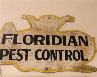 old pest control metal sign