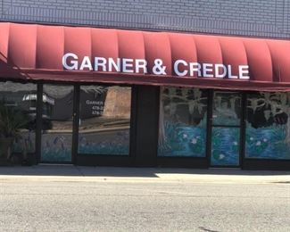 Look for the big red awning!!