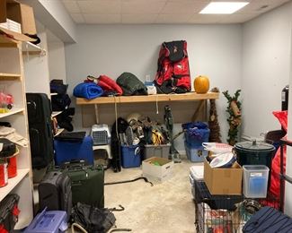 Animal crates, cages, supplies. Sleeping bags, blow-up mattresses, luggage, holiday items for Halloween and Christmas. Lots of holiday blow-up yard characters.