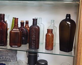 Many old bottles and stoneware