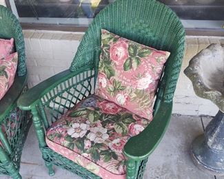 Three piece wicker set with nice upholstered seats and pillows