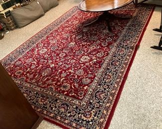 Oriental rug Approximately 7' x 10'    $125.00