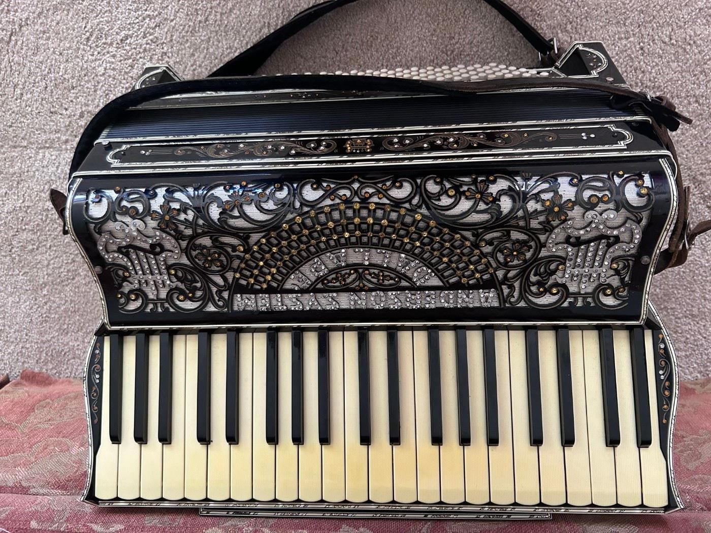 Early 19th Century Anderson Systems Dallape Accordion with Mother of Pearl and Rhinestones- beautiful!  Comes with case.