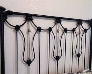 Antique cast iron and brass bed from 19th century, includes footboard (not pictured)