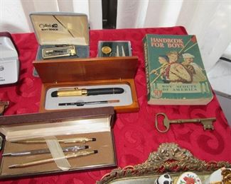 168 st pens, key, lighter