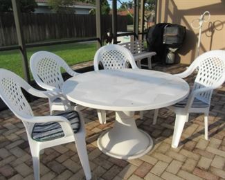 168 st patio table and 4 chairs