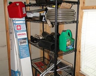 Hoses and garage items. Snow Roof rakes