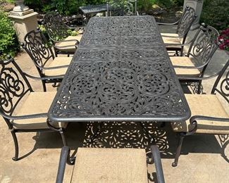 Aluminum grand table for 8 with 8 swivel rockers