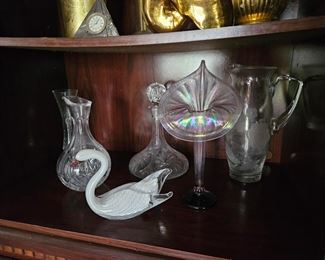 Decanter, pitchers and glass swan